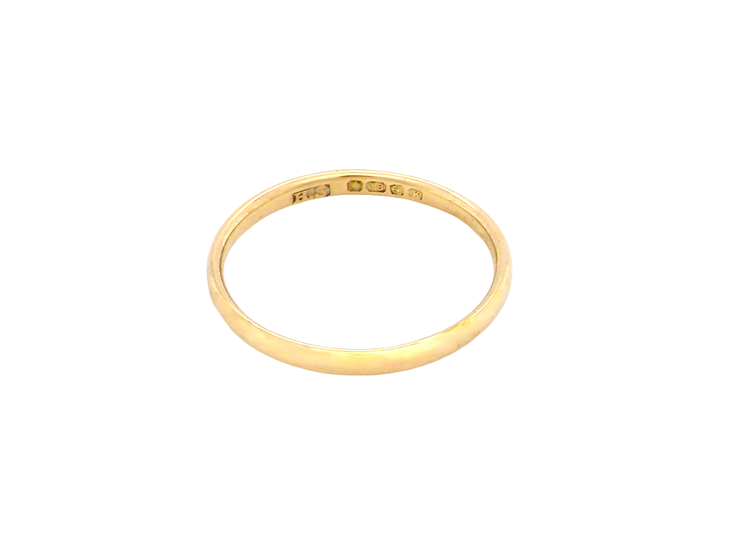 narrow 18 carat gold wedding ring. Traditional D shape profile.
Hallmarks for Birmingham