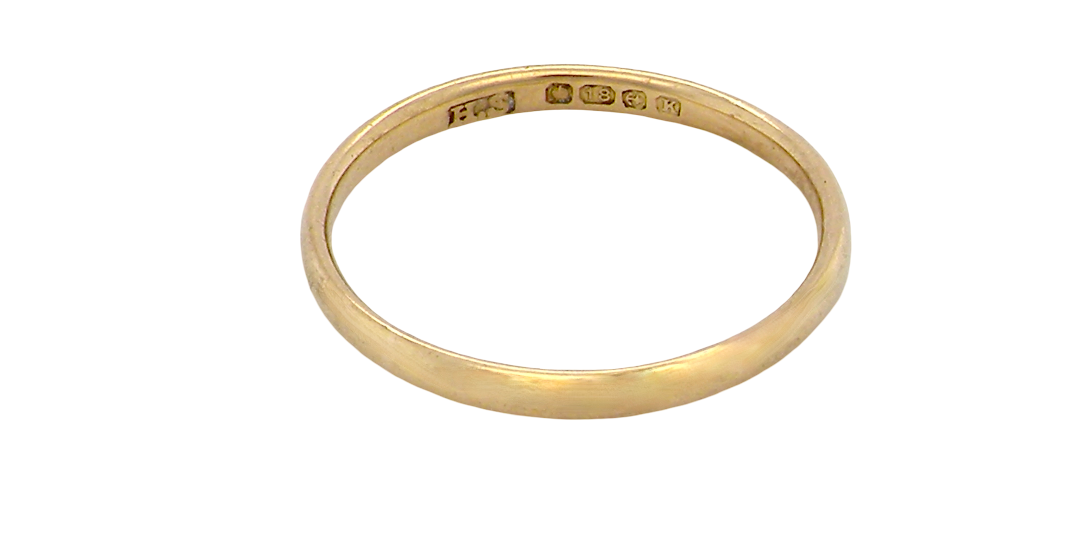 narrow 18 carat gold wedding ring. Traditional D shape profile.
Hallmarks for Birmingham 1934.