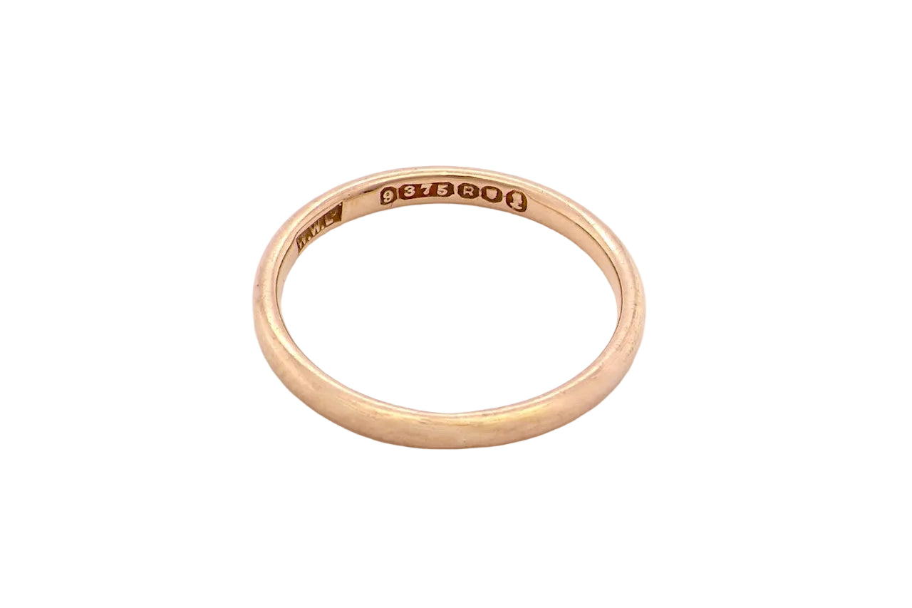 A narrow 9 carat gold wedding ring. D shape profile.
Width just over 2mm, weight 2 grams.