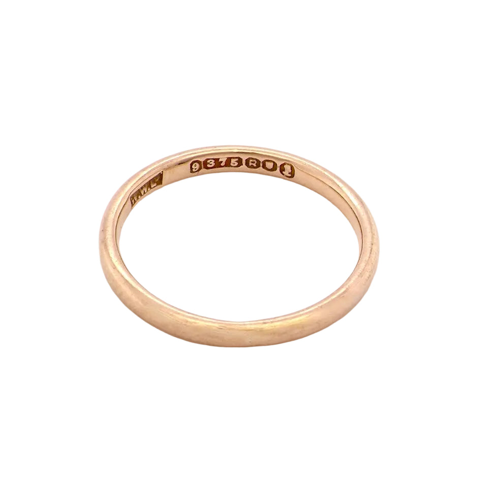 A narrow 9 carat gold wedding ring. D shape profile.
Width just over 2mm, weight 2 grams.
