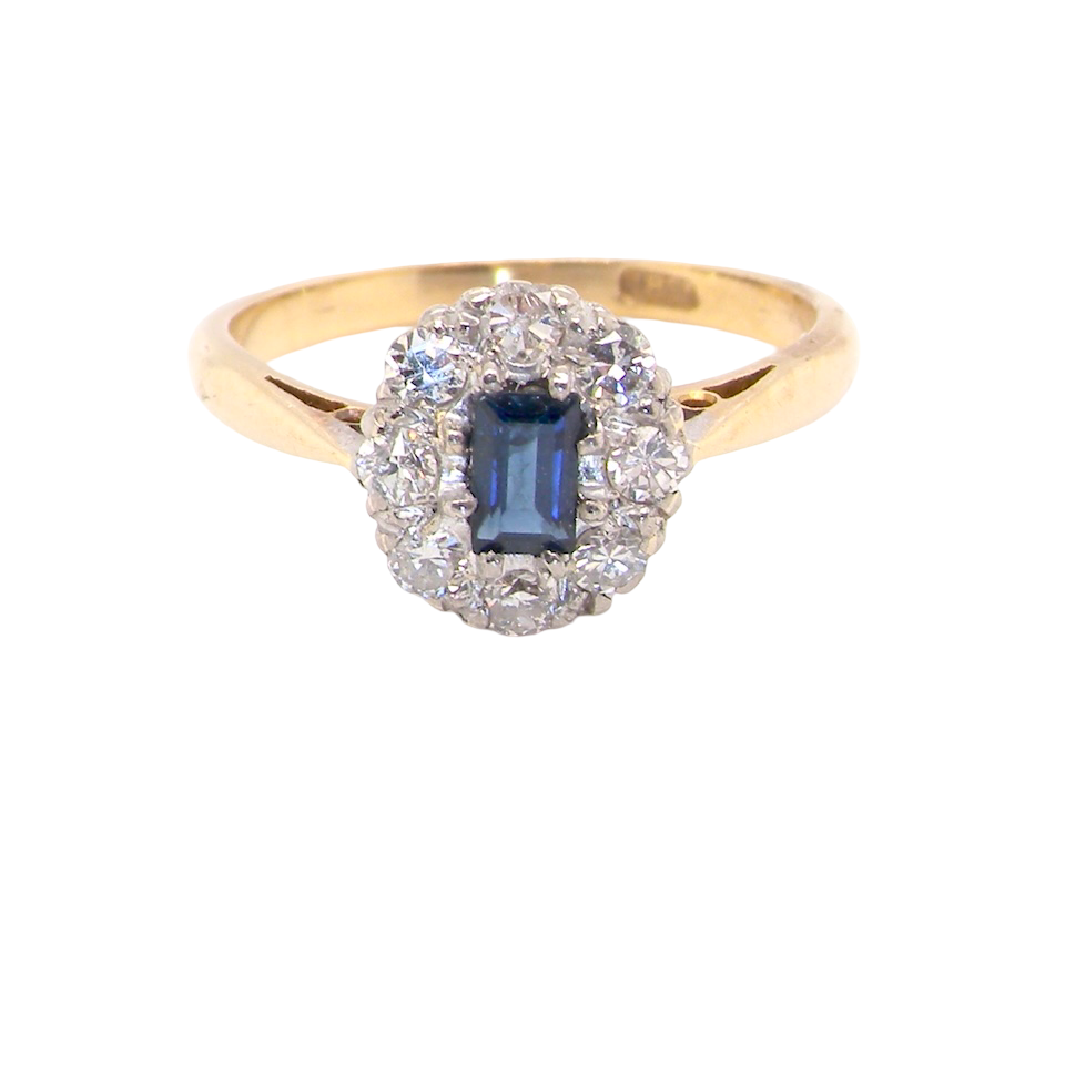 1970s cluster ring featuring a rectangular-cut sapphire,