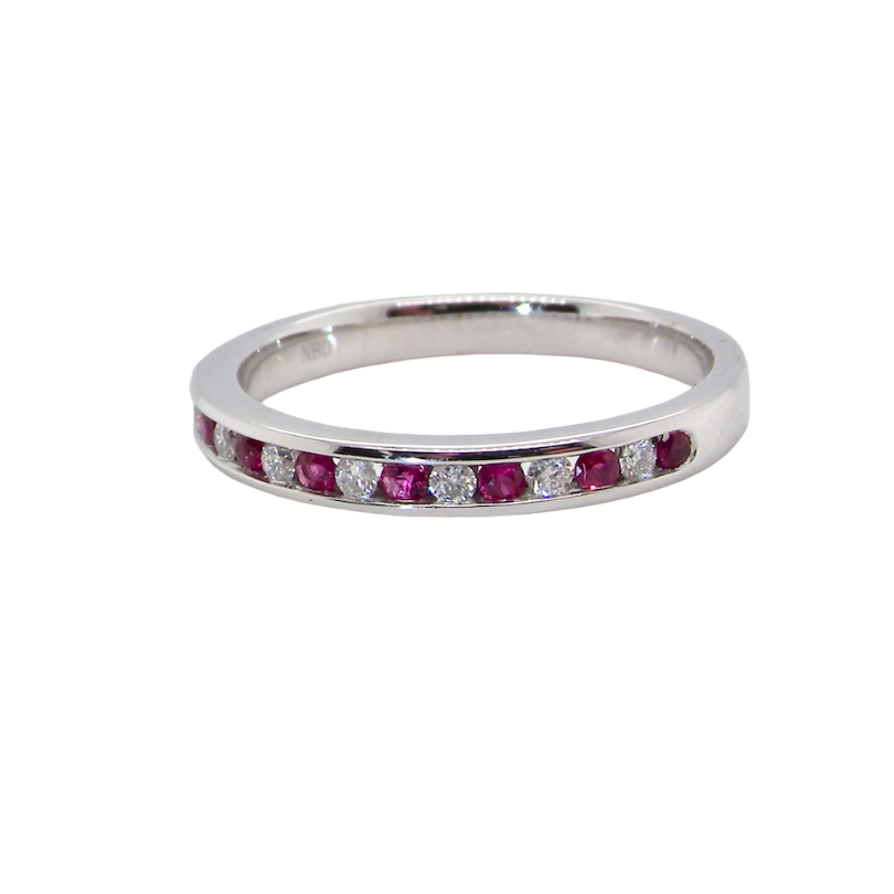 new A white gold half hoop eternity ring. Set with seven round rubies and six brilliant cut white diamonds