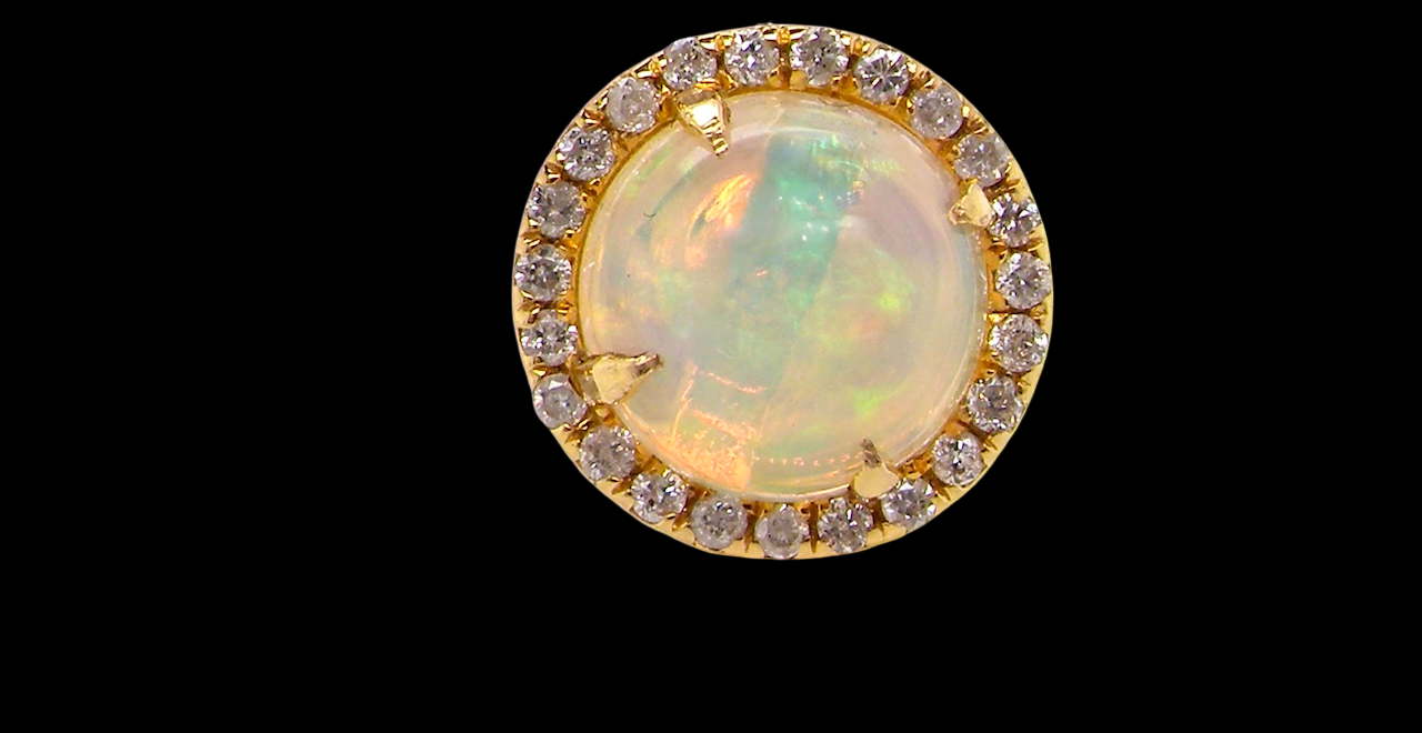 An exquisite pair of opal and diamond earrings