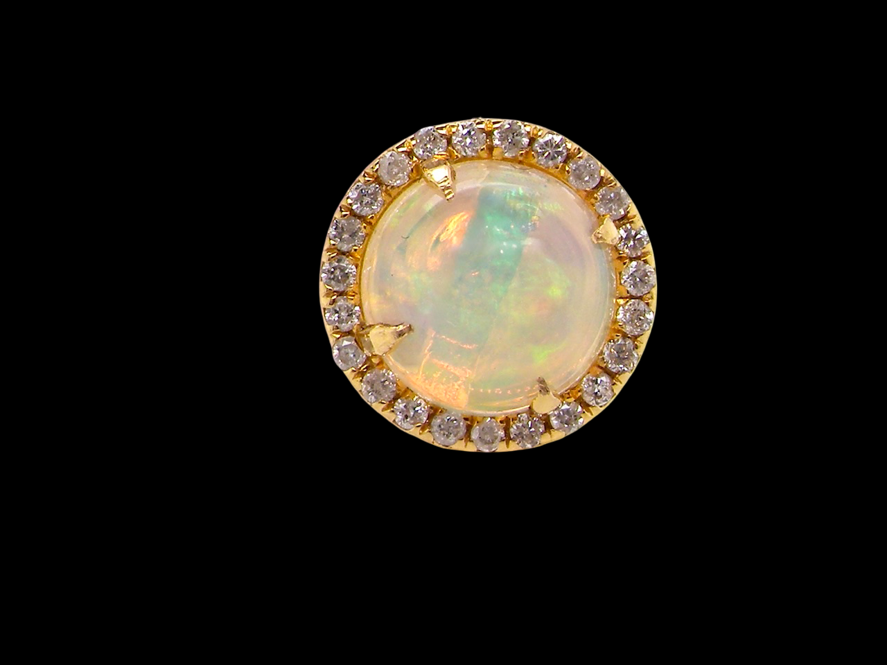 An exquisite pair of opal and diamond earrings