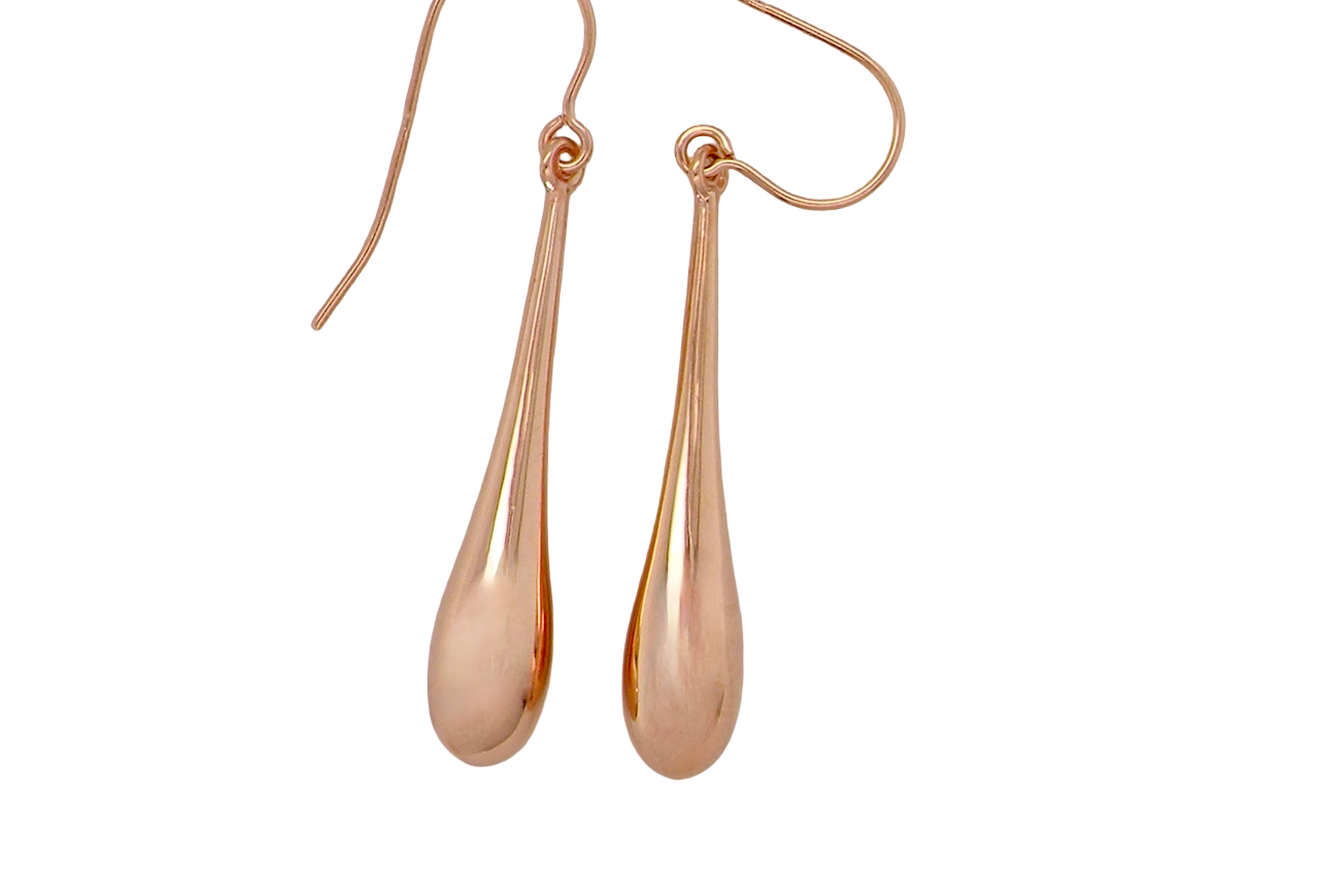 Rose gold teardrop earrings on a white background