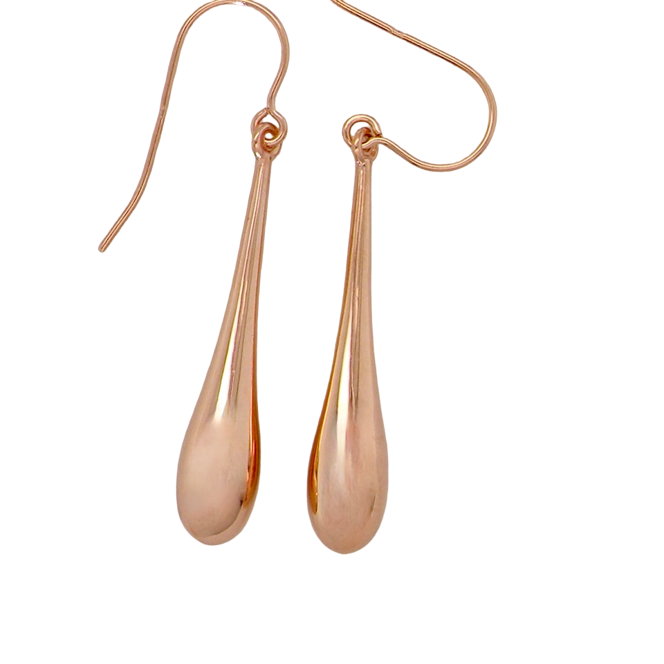 Rose gold teardrop earrings on a white background