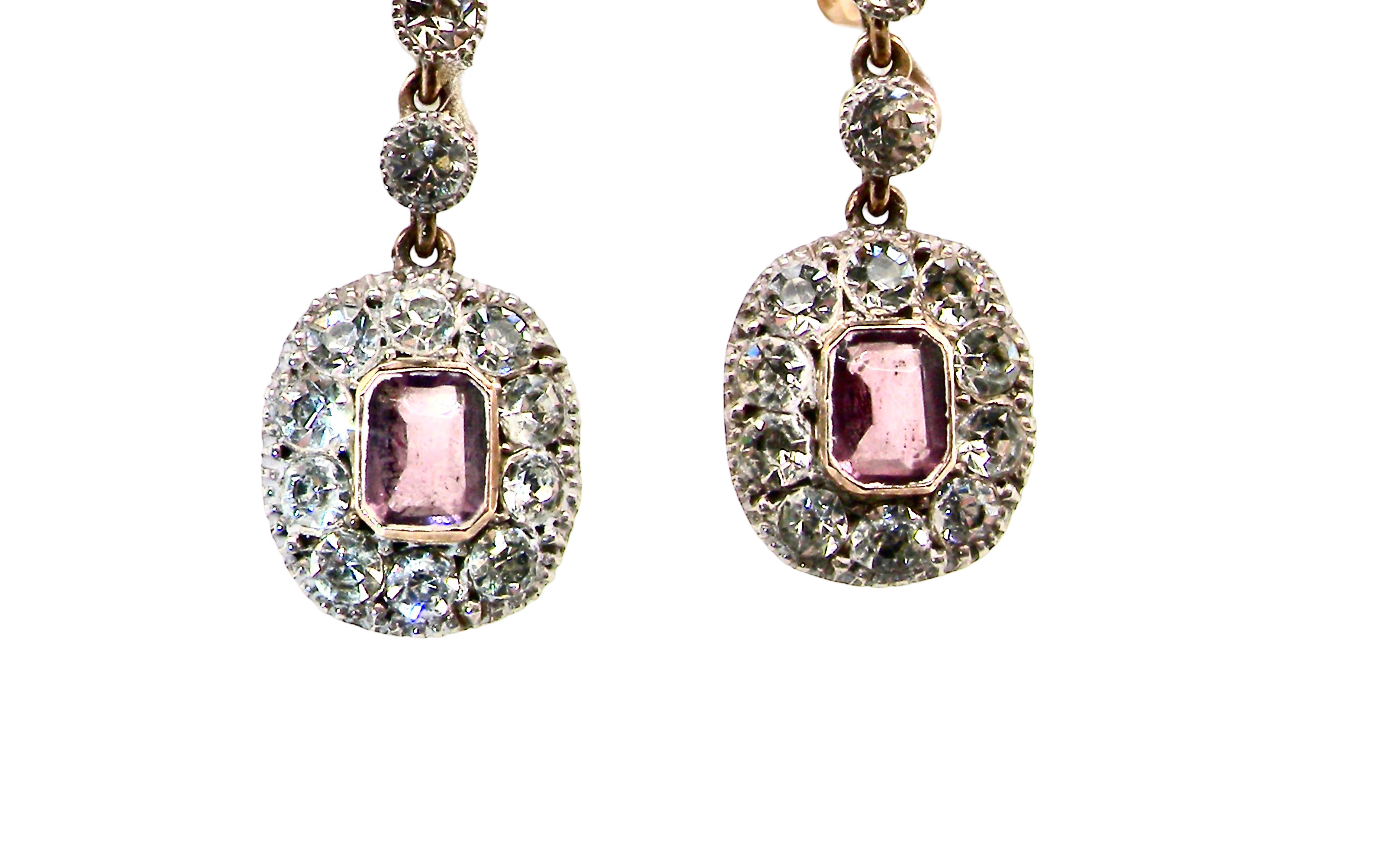 close view a pair of drop earrings from. the glamour era of the Edwardian era.