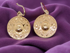 pair of round shaped earrings