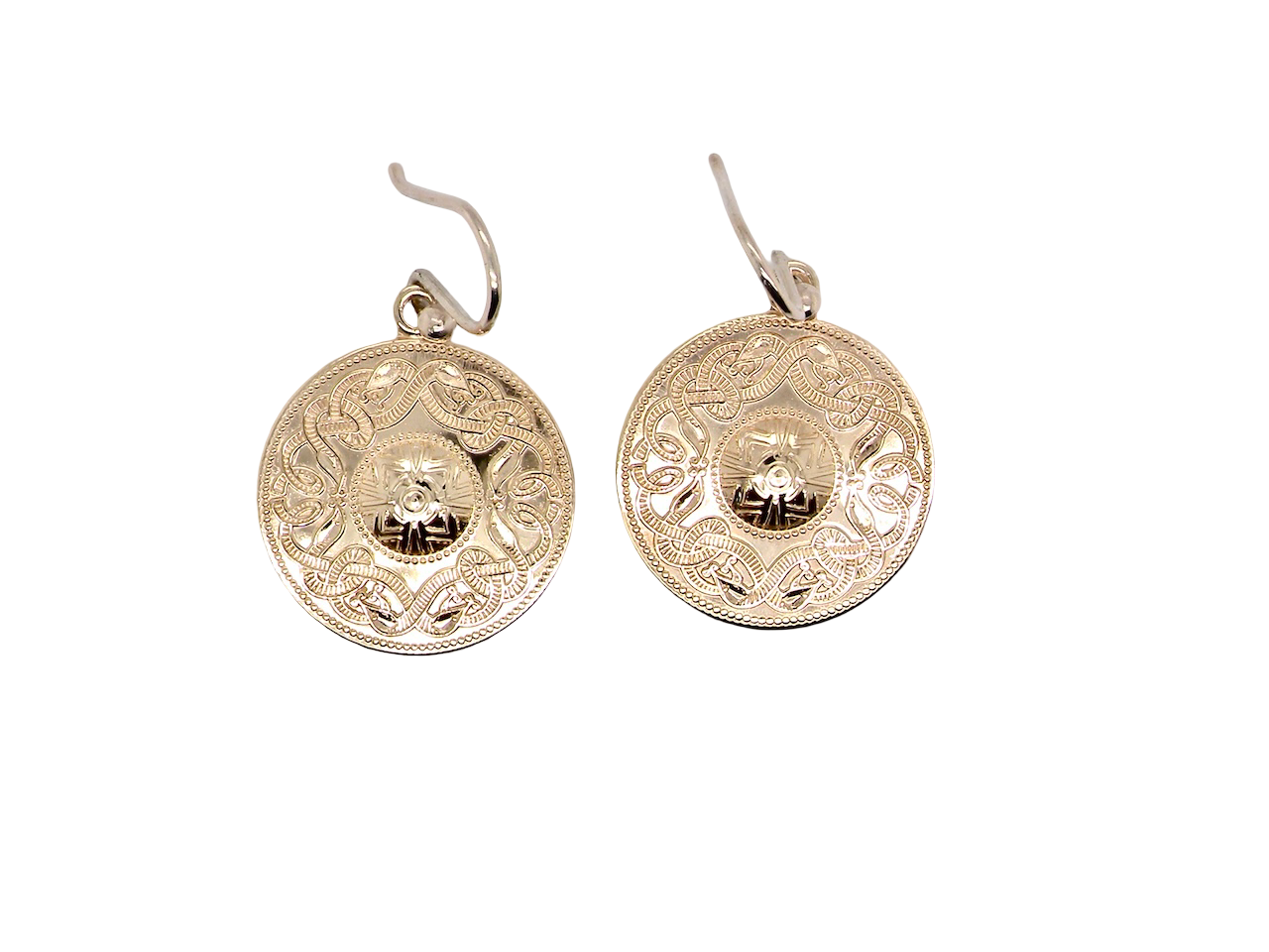 A pair of disc shaped earrings