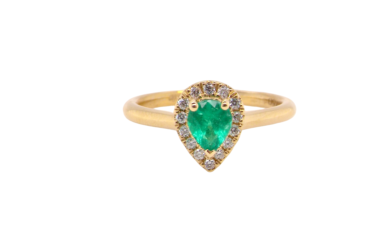 A new pear shaped Emerald and Diamond ring