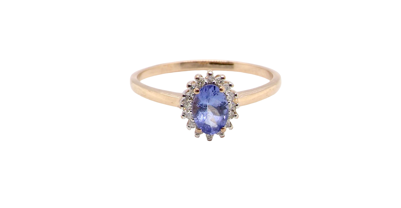 pretty cluster ring that features an oval cut tanzanite gemstone,