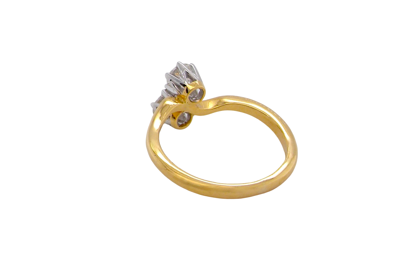 rear A beautifully balanced Moi et Toi ring featuring two sparkling modern brilliant-cut diamonds
