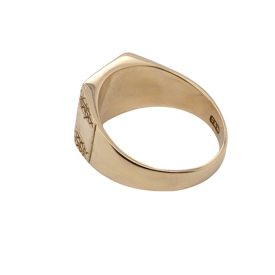 rear A 1970s gentleman's 9 carat gold signet ring.