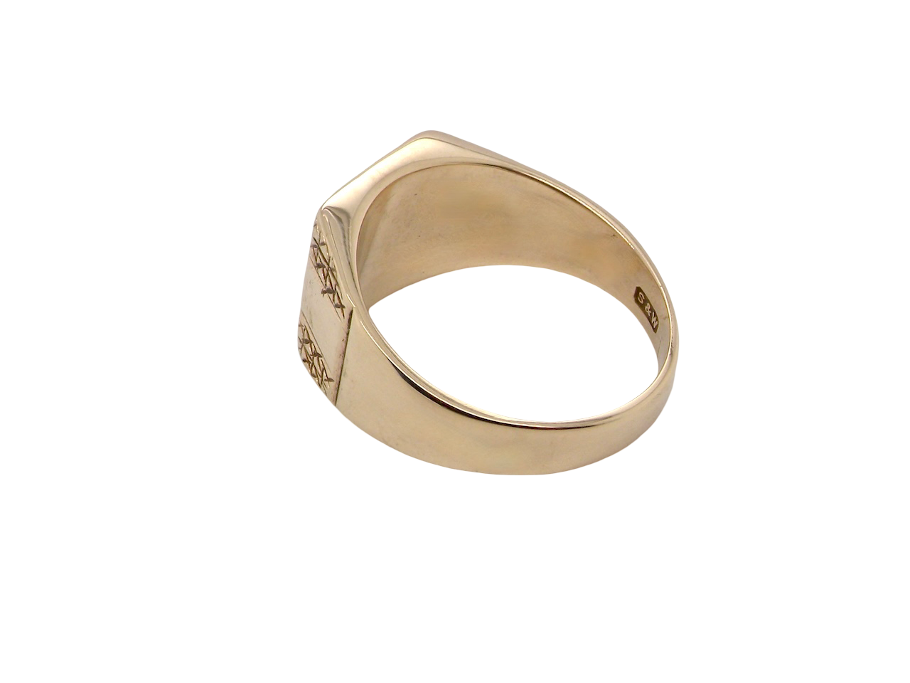 rear A 1970s gentleman's 9 carat gold signet ring.