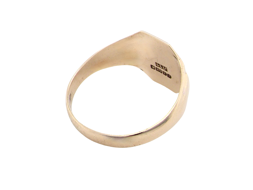 rear A 9 carat gold gentlemans signet ring. The head is eight sided, half hand engraved, measures 11.9x11.9mm, weight 2.3grams.