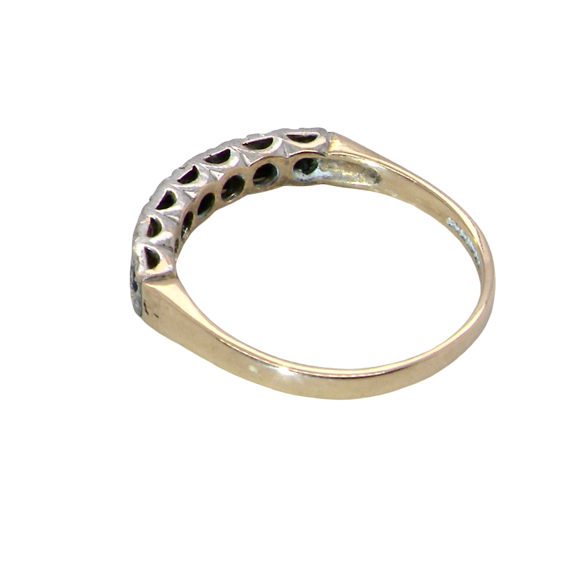 rear A 9 carat gold half hoop eternity ring. Set with four sapphires, each 2.4mm, and between each a 1mm illusion set diamond.