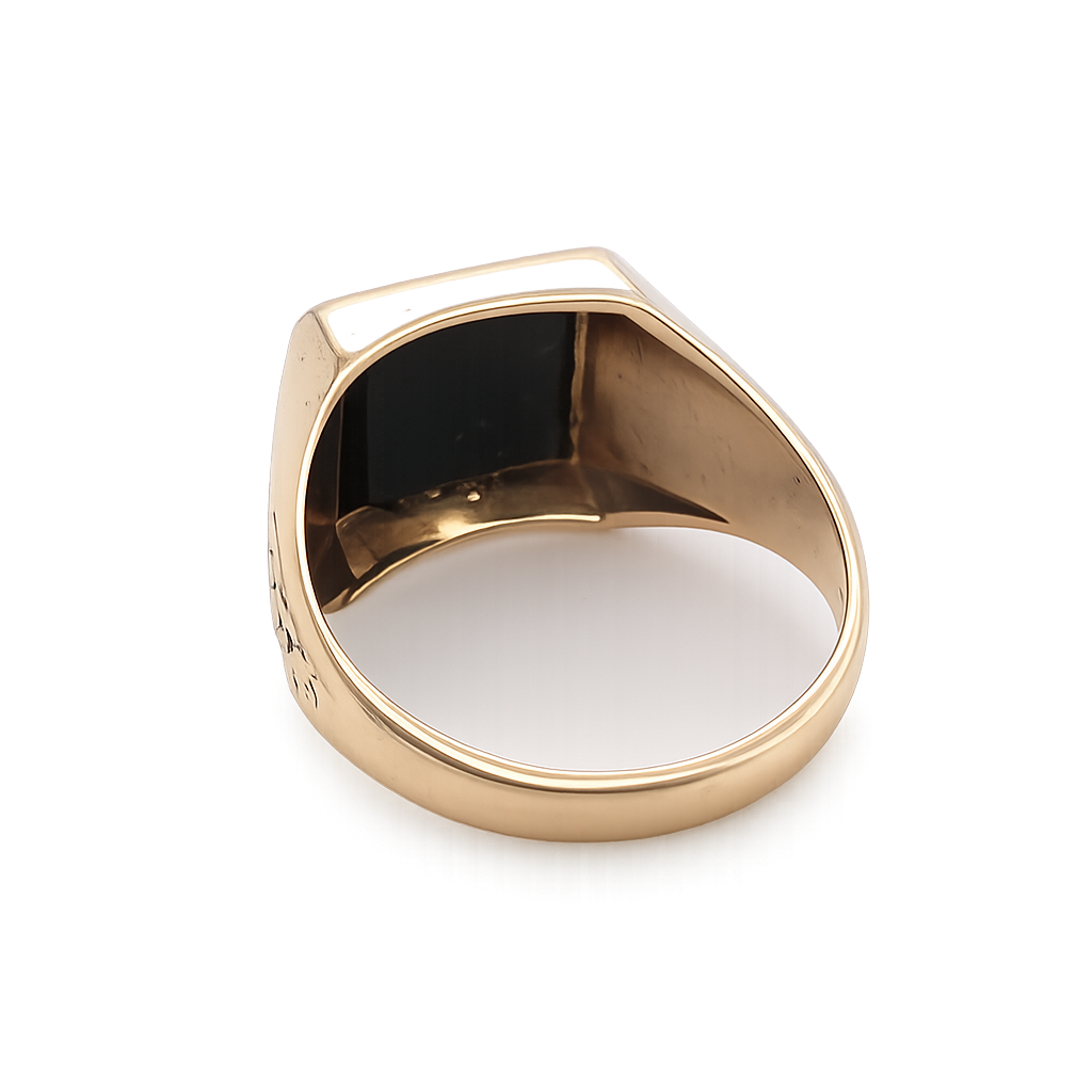rear A 9 carat gold signet ring. Features a square cut black onyx stone, 10x10mm (est) .