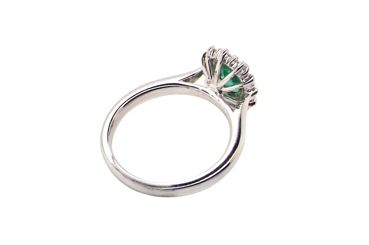 A NEW Emerald and Diamond ring
