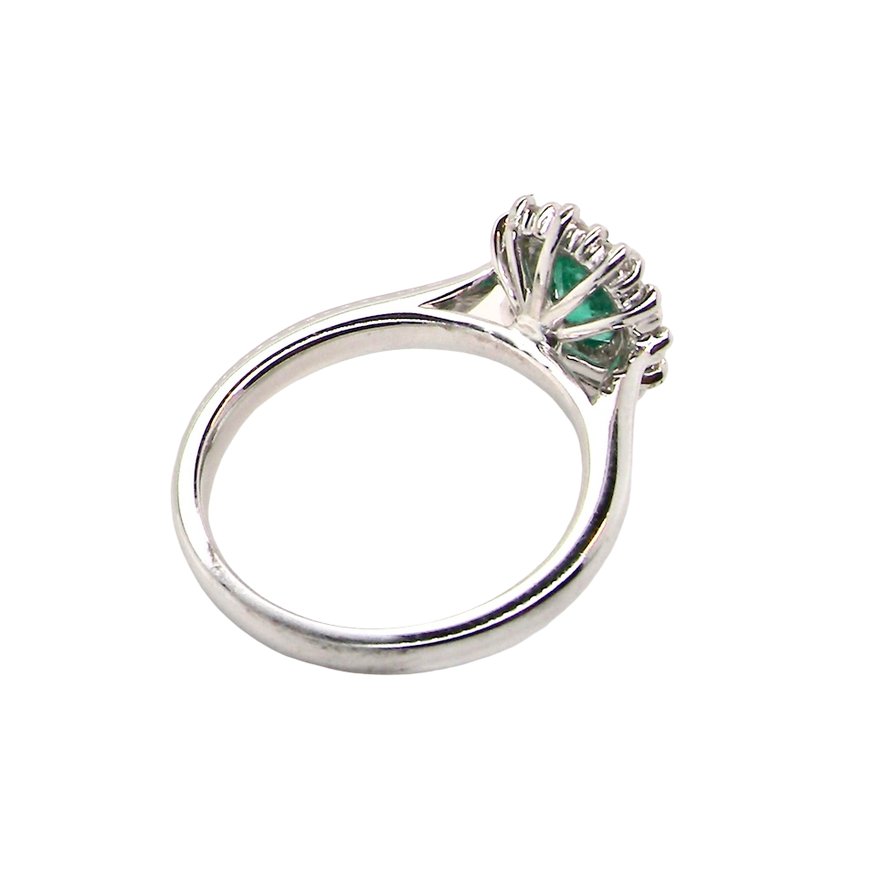 A NEW Emerald and Diamond ring