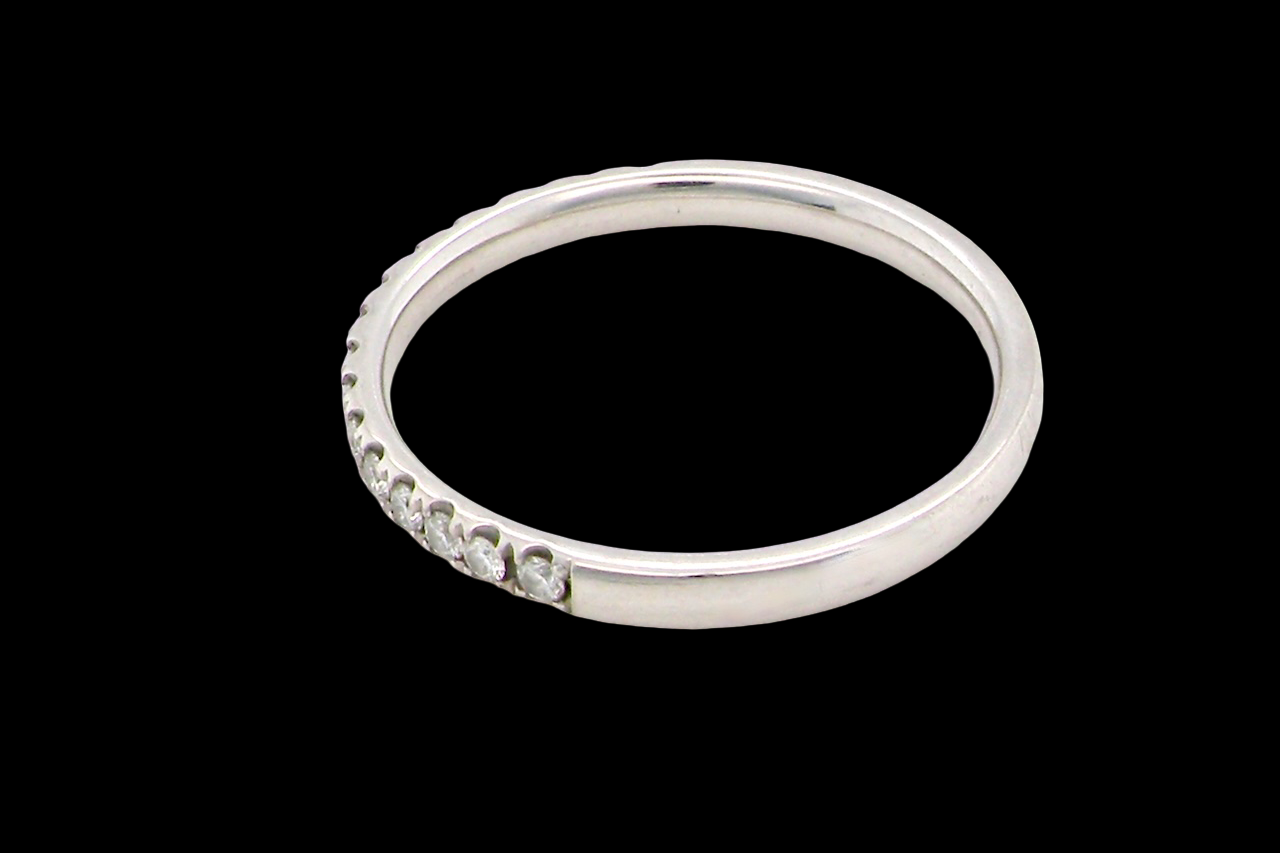 A Modern Platinum Half Hoop Diamond Eternity Ring