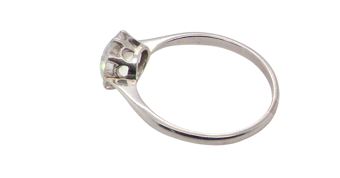 rear A beautiful and timeless vintage solitaire dating from the 1930s, crafted in platinum and set with a stunning old brilliant-cut diamond.
