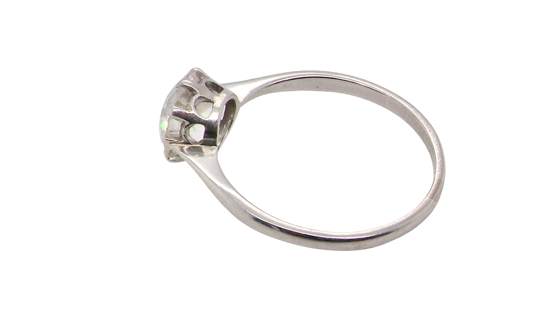 rear A beautiful and timeless vintage solitaire dating from the 1930s, crafted in platinum and set with a stunning old brilliant-cut diamond.