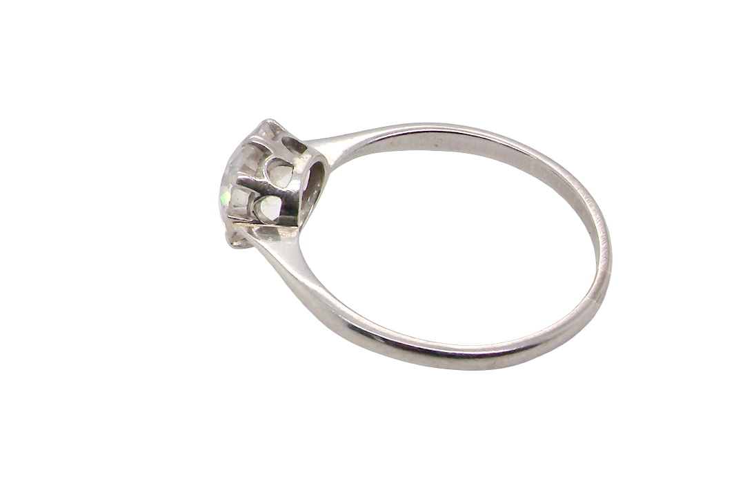 rear A beautiful and timeless vintage solitaire dating from the 1930s, crafted in platinum and set with a stunning old brilliant-cut diamond.