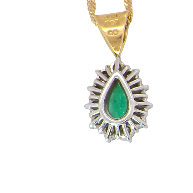 rear A beautiful pear shaped pendant. The emerald measures 7x5mm (0.75 carats est), good deep grass green colour.