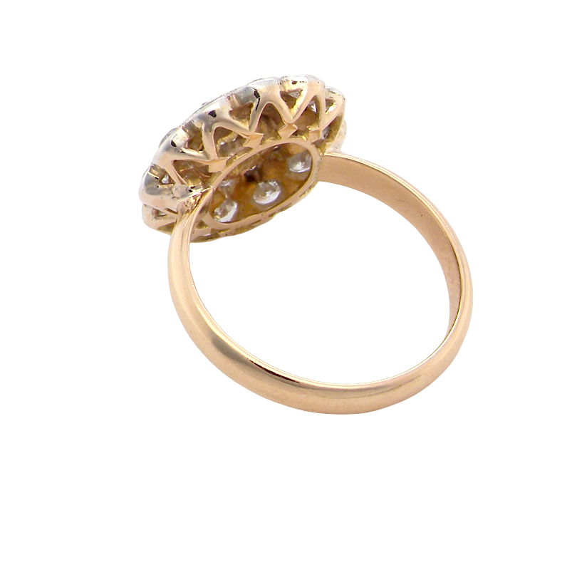 rear A beautiful vintage diamond cluster ring. Know as a target cluster, the diamonds are old brilliant cut. Centre diamond 3.8mm (0.20 carats) . 