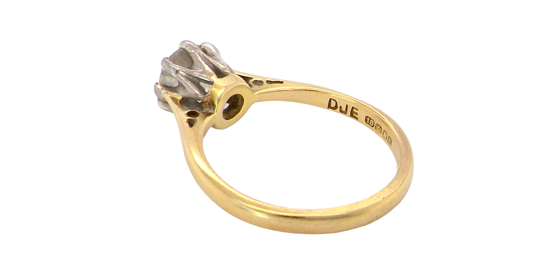rear A beautiful vintage diamond solitaire ring featuring an old brilliant cut white diamond measuring approximately 6mm, estimated at 0.75 carats. The diamond displays attractive sparkle with an assessed colour of I–J and clarity of SI.