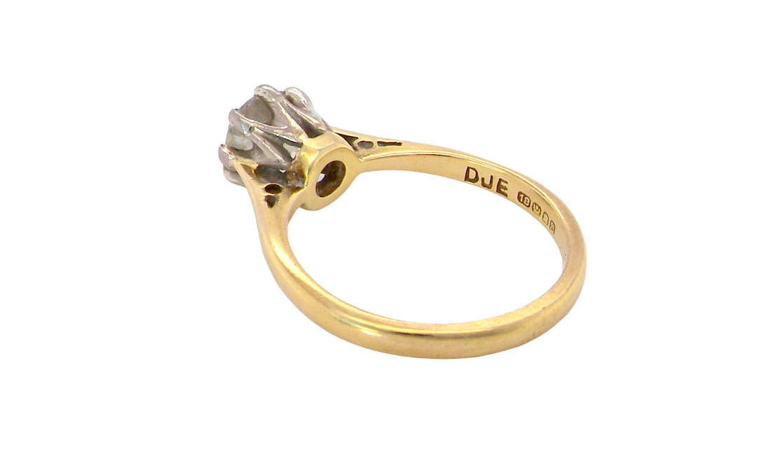 rear A beautiful vintage diamond solitaire ring featuring an old brilliant cut white diamond measuring approximately 6mm, estimated at 0.75 carats. The diamond displays attractive sparkle with an assessed colour of I–J and clarity of SI.