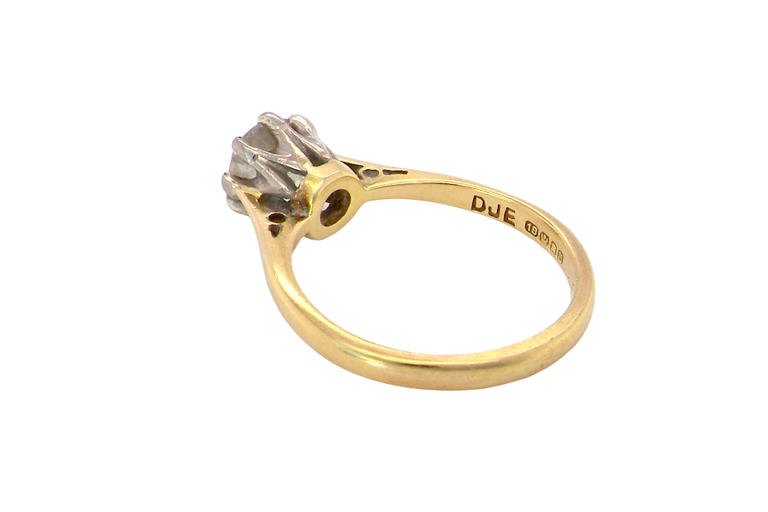 rear A beautiful vintage diamond solitaire ring featuring an old brilliant cut white diamond measuring approximately 6mm, estimated at 0.75 carats. The diamond displays attractive sparkle with an assessed colour of I–J and clarity of SI.