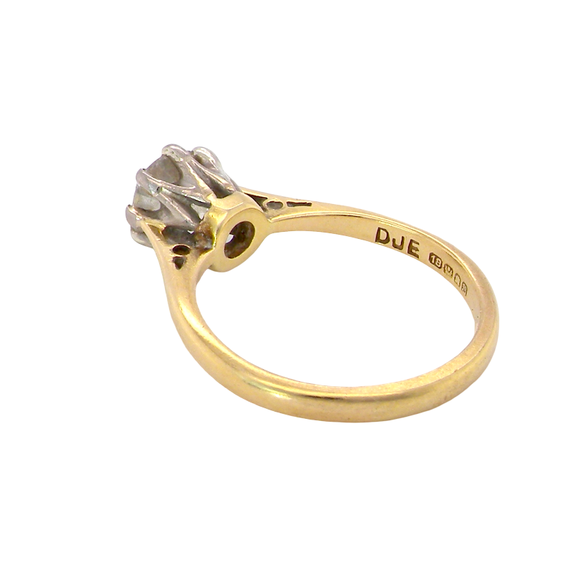 rear A beautiful vintage diamond solitaire ring featuring an old brilliant cut white diamond measuring approximately 6mm, estimated at 0.75 carats. The diamond displays attractive sparkle with an assessed colour of I–J and clarity of SI.