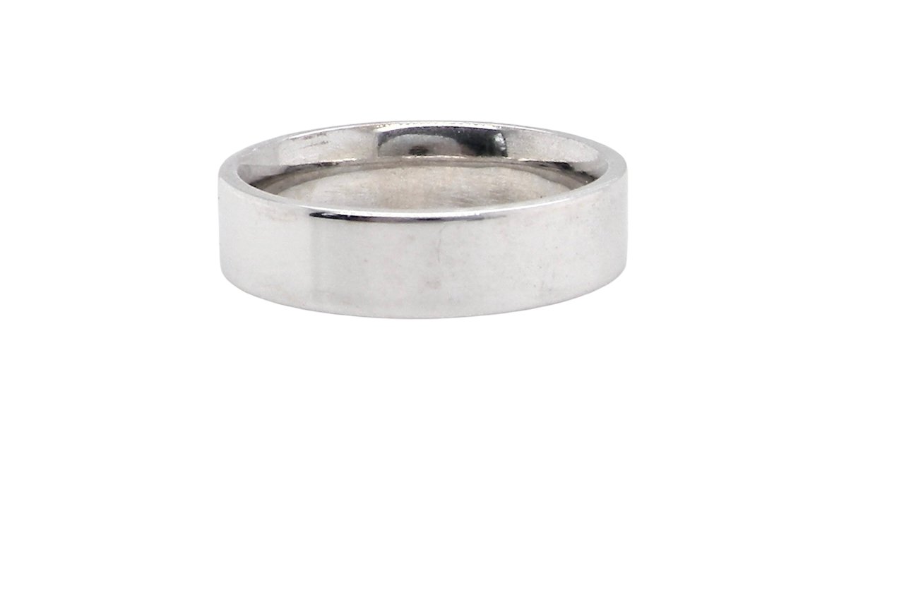rear A classic 9 carat white gold ring with a timeless wedding-band style, equally suited to wear as a simple diamond dress ring.