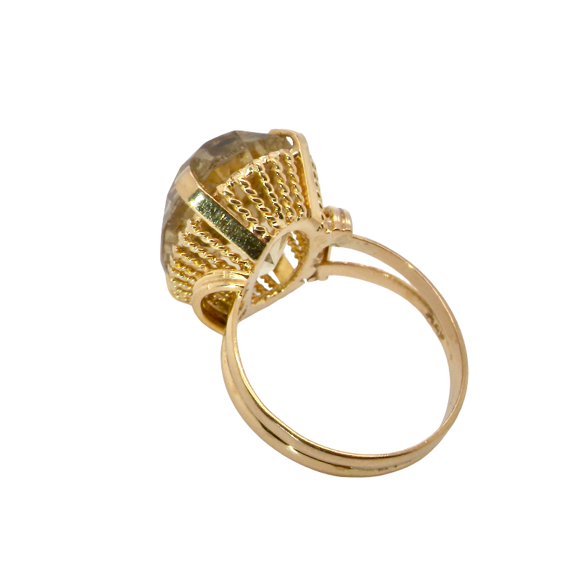 rear A continental dress ring that tests as 18 carat gold. Features a large citrine gemstone, that measures 18x13mm, depth 9mm. Golden yellow with a hint of olive green. 