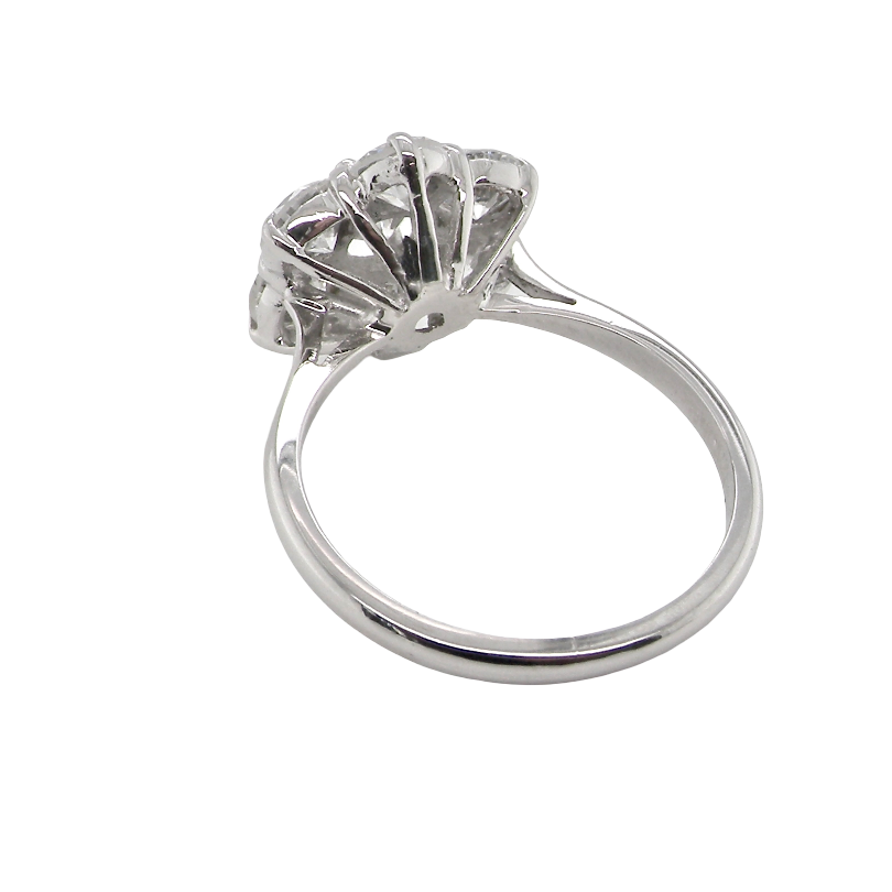 rear A fabulous vintage diamond cluster ring, beautifully crafted in 18 carat white gold and set with seven fine brilliant cut white diamonds.