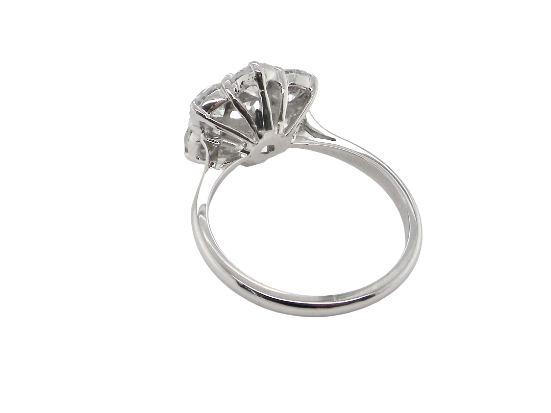 rear A fabulous vintage diamond cluster ring, beautifully crafted in 18 carat white gold and set with seven fine brilliant cut white diamonds.