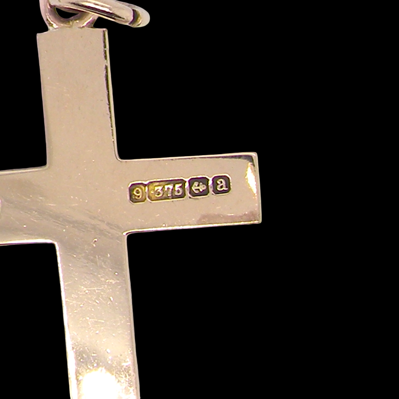 rear A fine 9 carat gold cross. Hand engrarved across the whole body of the cross which measures 45x25mm
