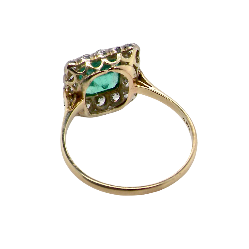 rear A fine Art Deco emerald and diamond cluster ring, beautifully proportioned and displaying all the elegance associated with the period.