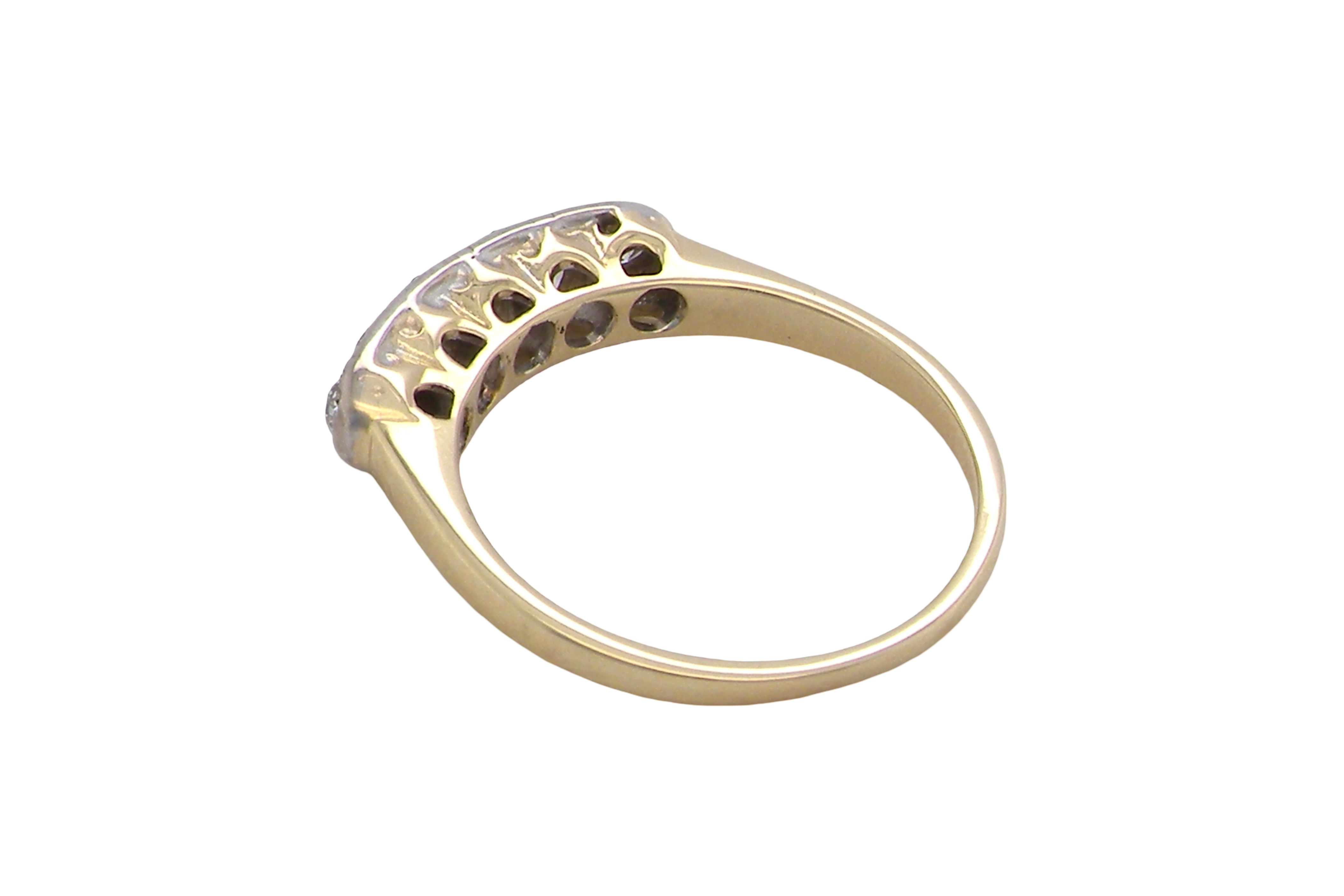 rear A fine vintage ring set with five brilliant cut white diamonds.
Centre diamond 3.6mm (est 0.15 carats)