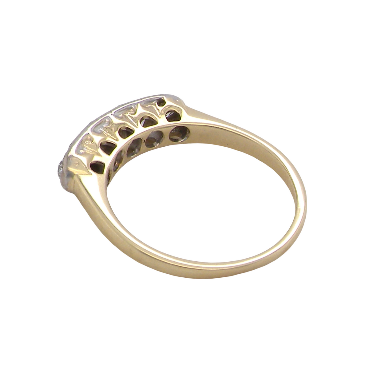 rear A fine vintage ring set with five brilliant cut white diamonds.
Centre diamond 3.6mm (est 0.15 carats)