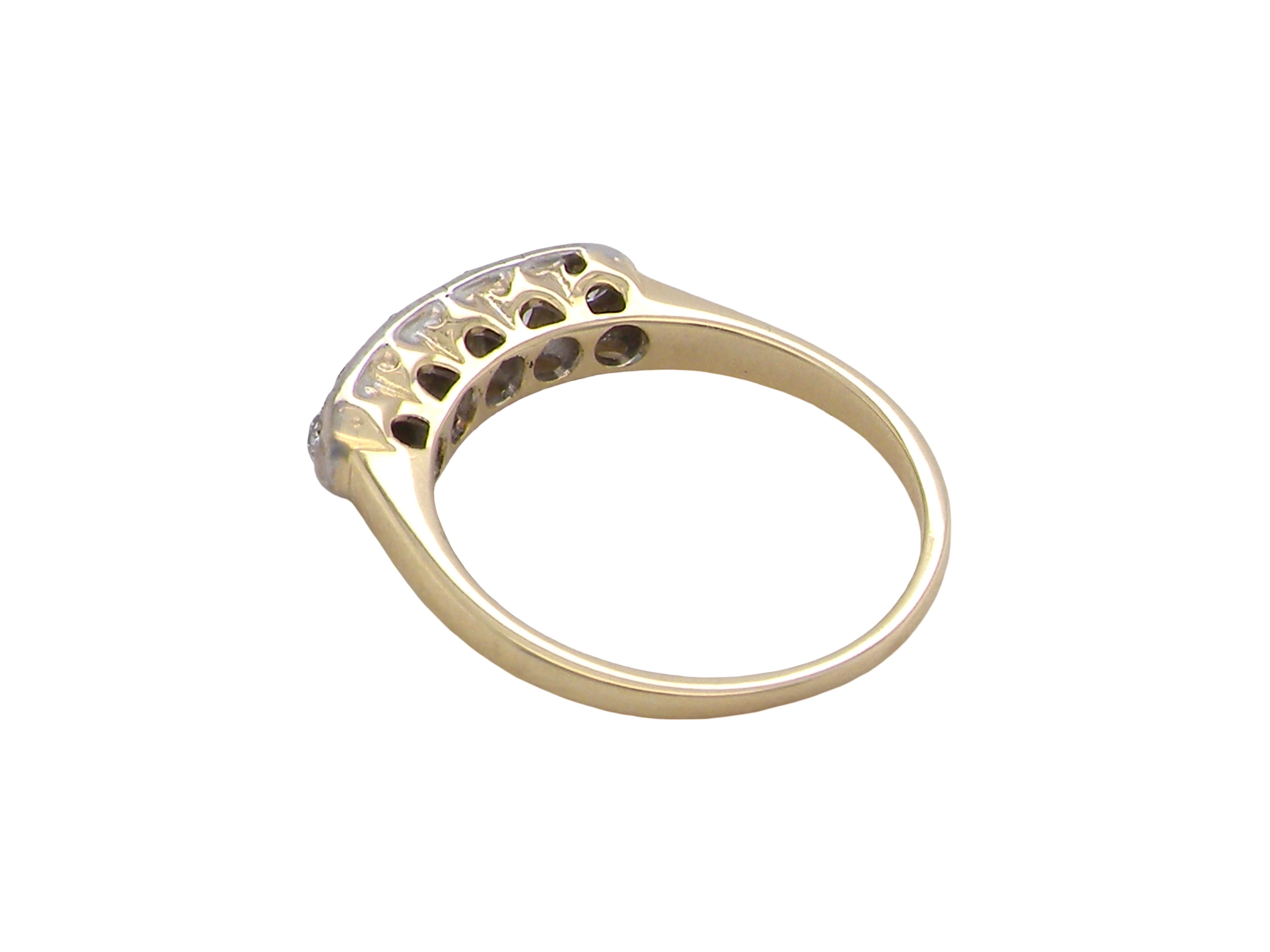 rear A fine vintage ring set with five brilliant cut white diamonds.
Centre diamond 3.6mm (est 0.15 carats)