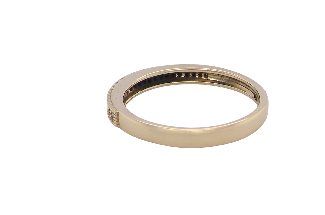 rear A half-hoop eternity ring set with approximately twenty-four white diamonds