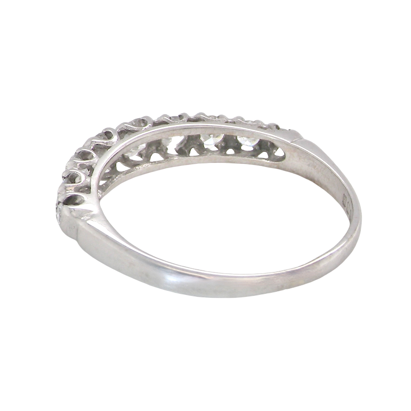 ring with a decorative openwork top band, photographed on a plain white background.