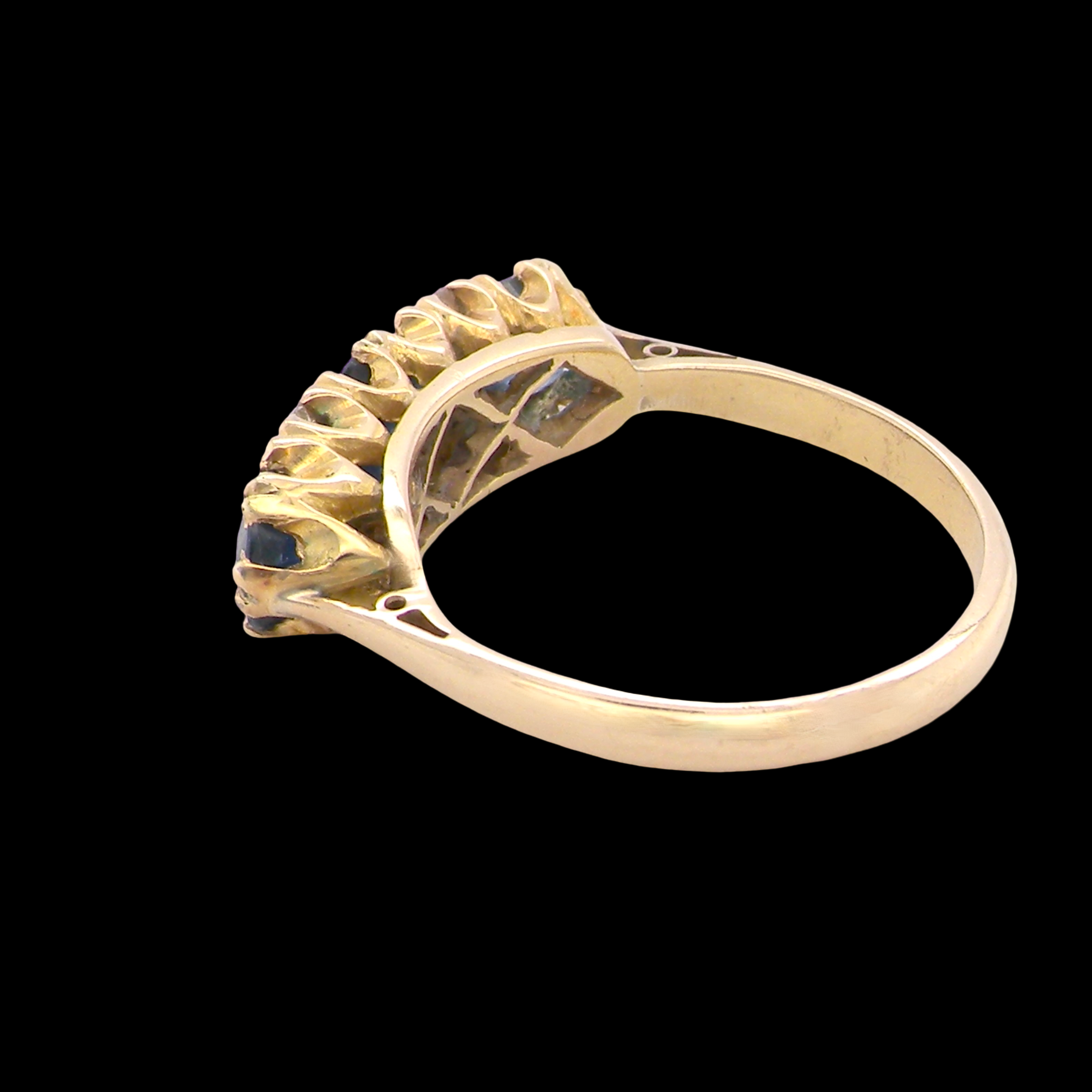 rear A lovely ring from the turn of the 19th century. Set with impressive round sapphires,