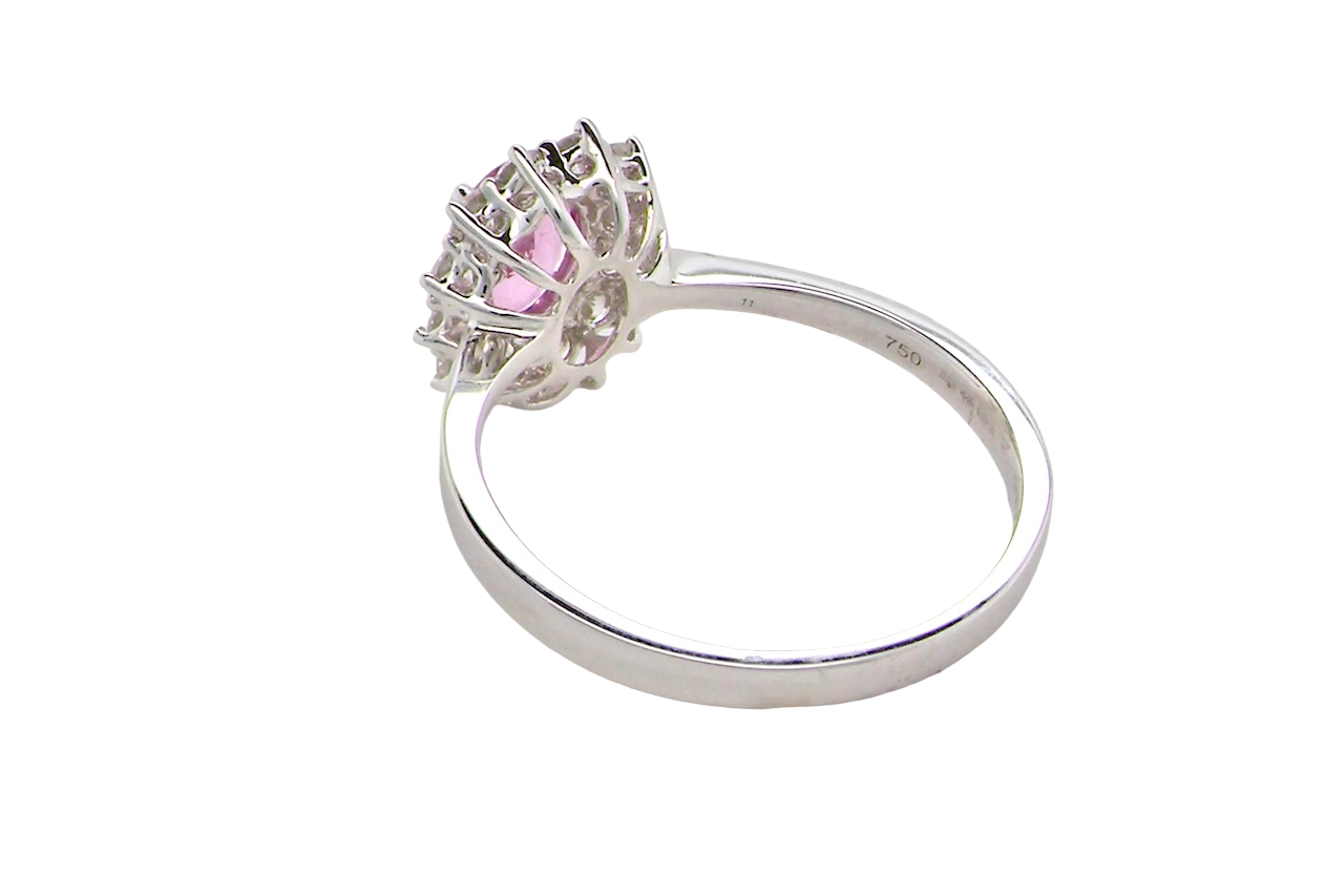 A modern Pink Sapphire and Diamond Ring