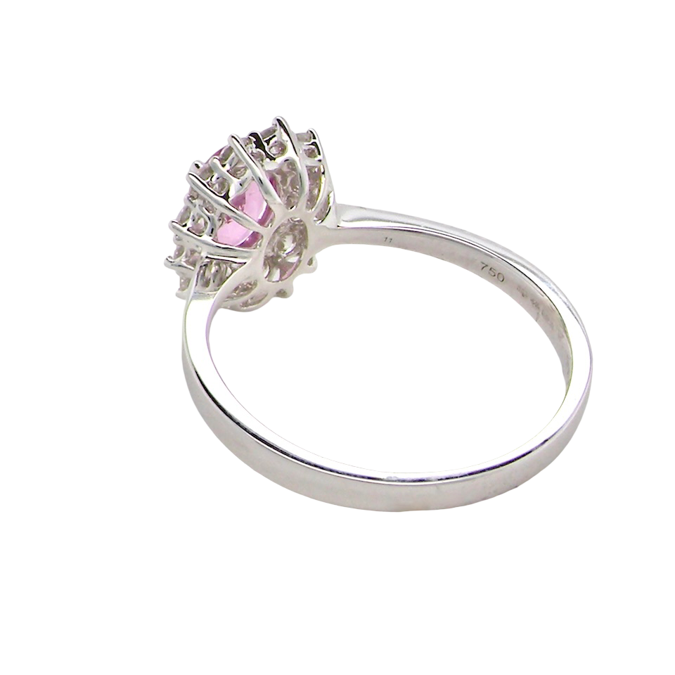 A modern Pink Sapphire and Diamond Ring
