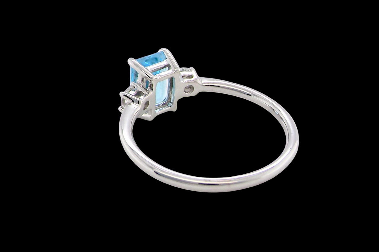 rear A 9 carat white gold three stone ring. This ring is from our Heirloom Collection. This is when we take a stone from a pre-owned ring that is worn out, and reset it into a brand new setting.