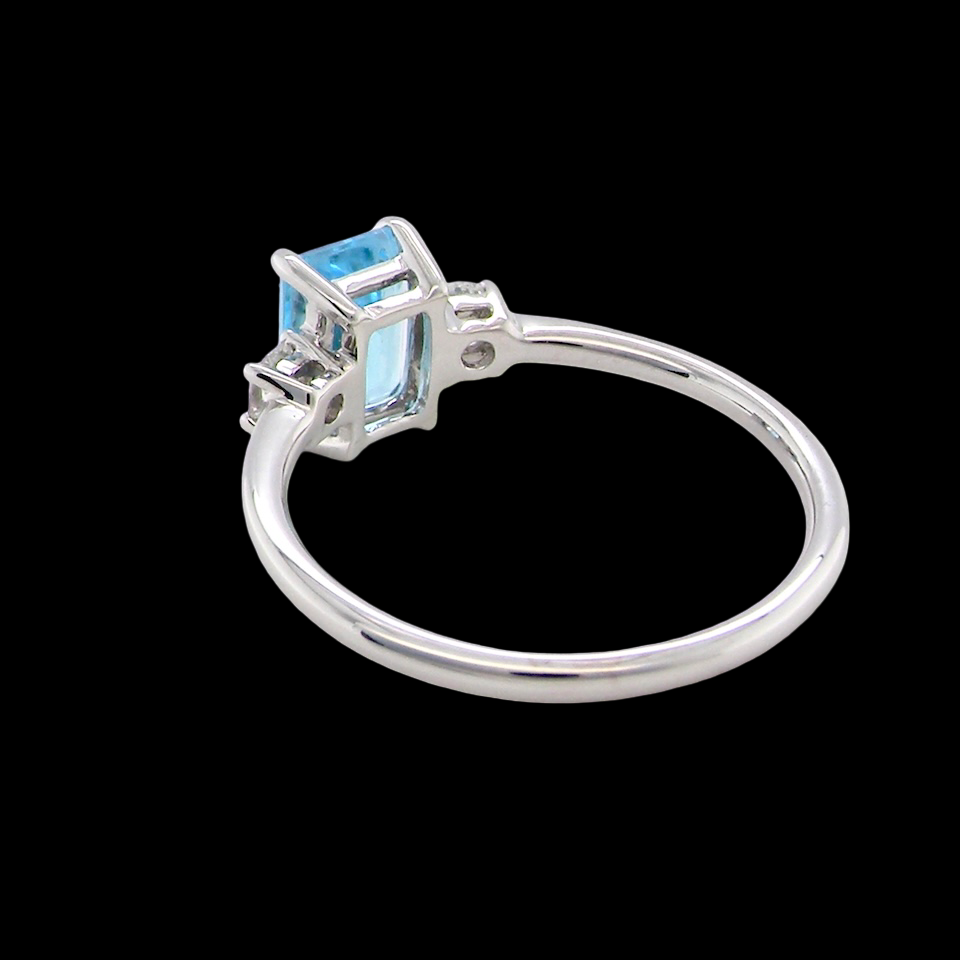 rear A 9 carat white gold three stone ring. This ring is from our Heirloom Collection. This is when we take a stone from a pre-owned ring that is worn out, and reset it into a brand new setting.