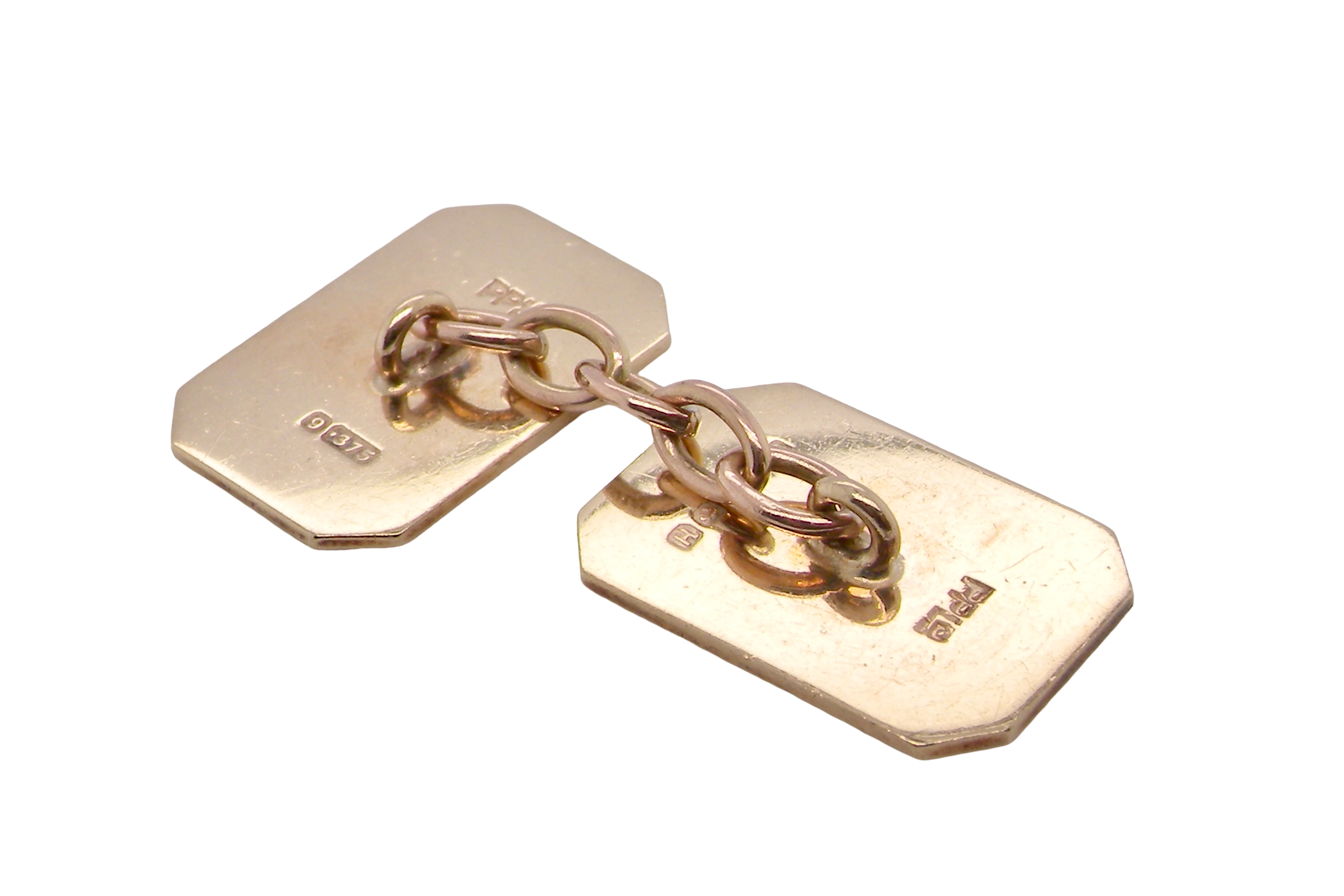 rear A pair of double link cufflinks. Each rectangular in shape, measure 18x12mm. 